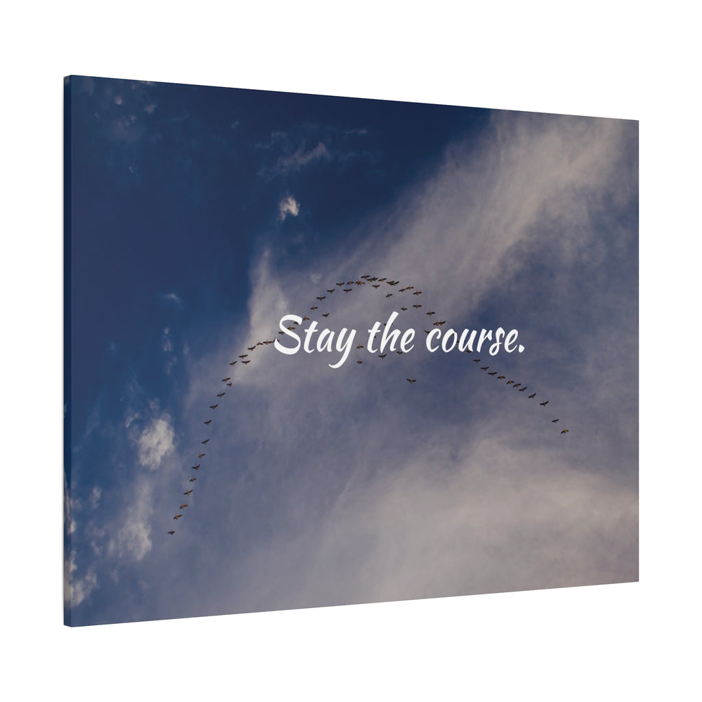 Flock of birds flying in a V-formation against a blue sky with the text 'Stay the course.'
