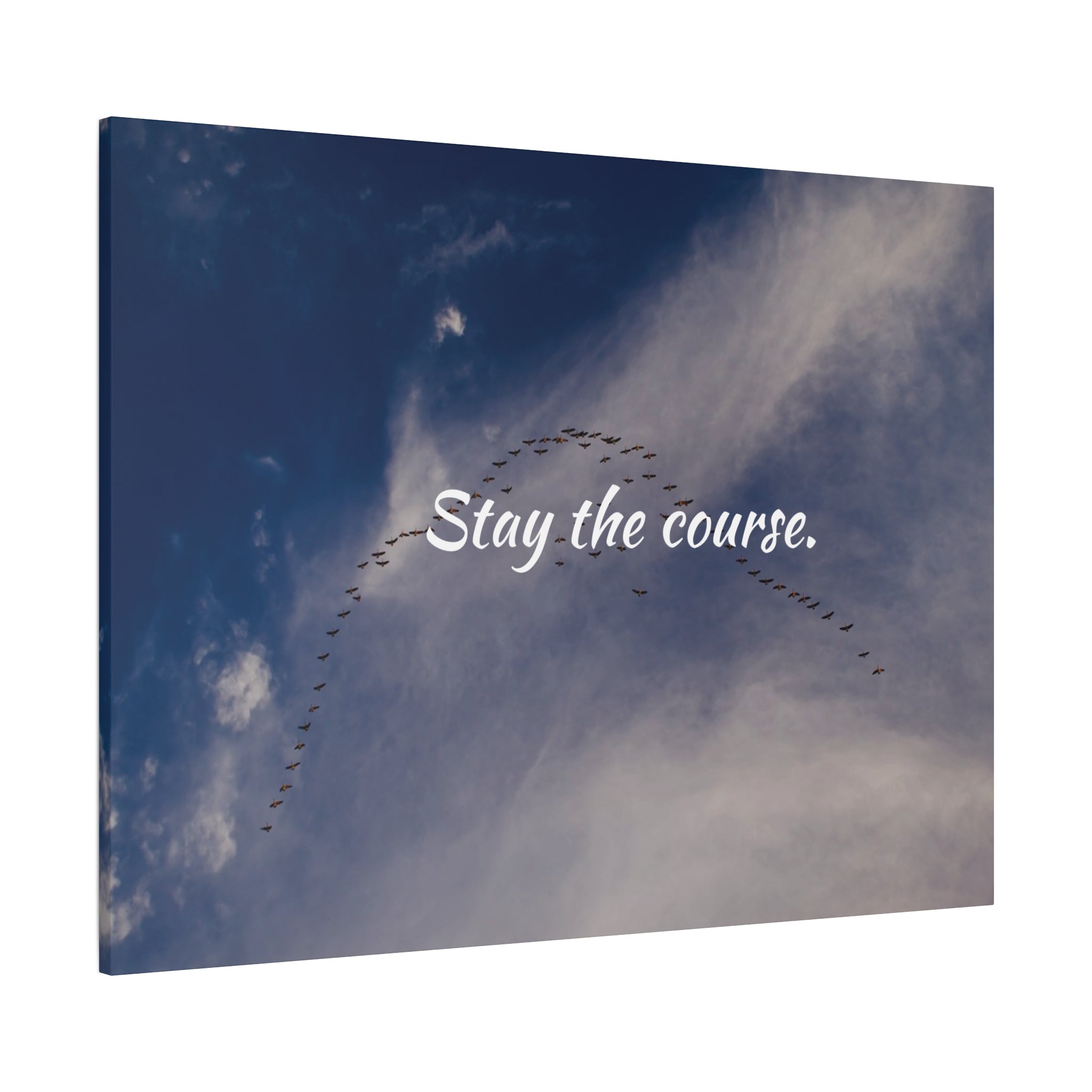 Flock of birds flying in a V-formation against a blue sky with the text 'Stay the course.'