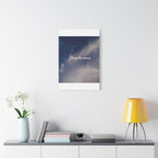 Poster with 'Stay the course' text on a wall above a shelf with decor items.