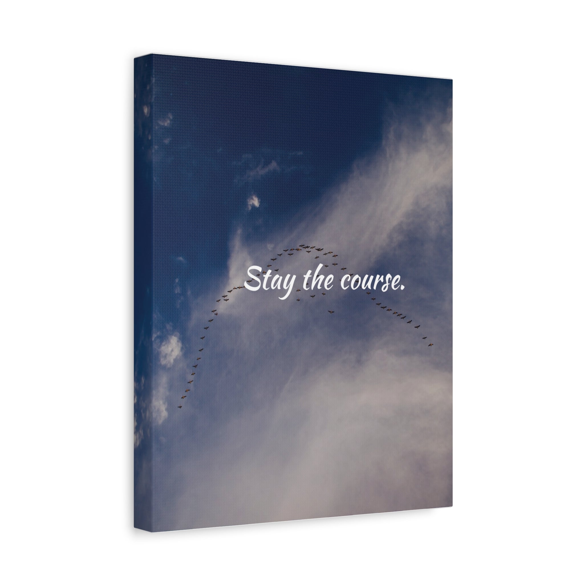 Canvas print with a flock of birds flying in the sky and the text 'Stay the course.'