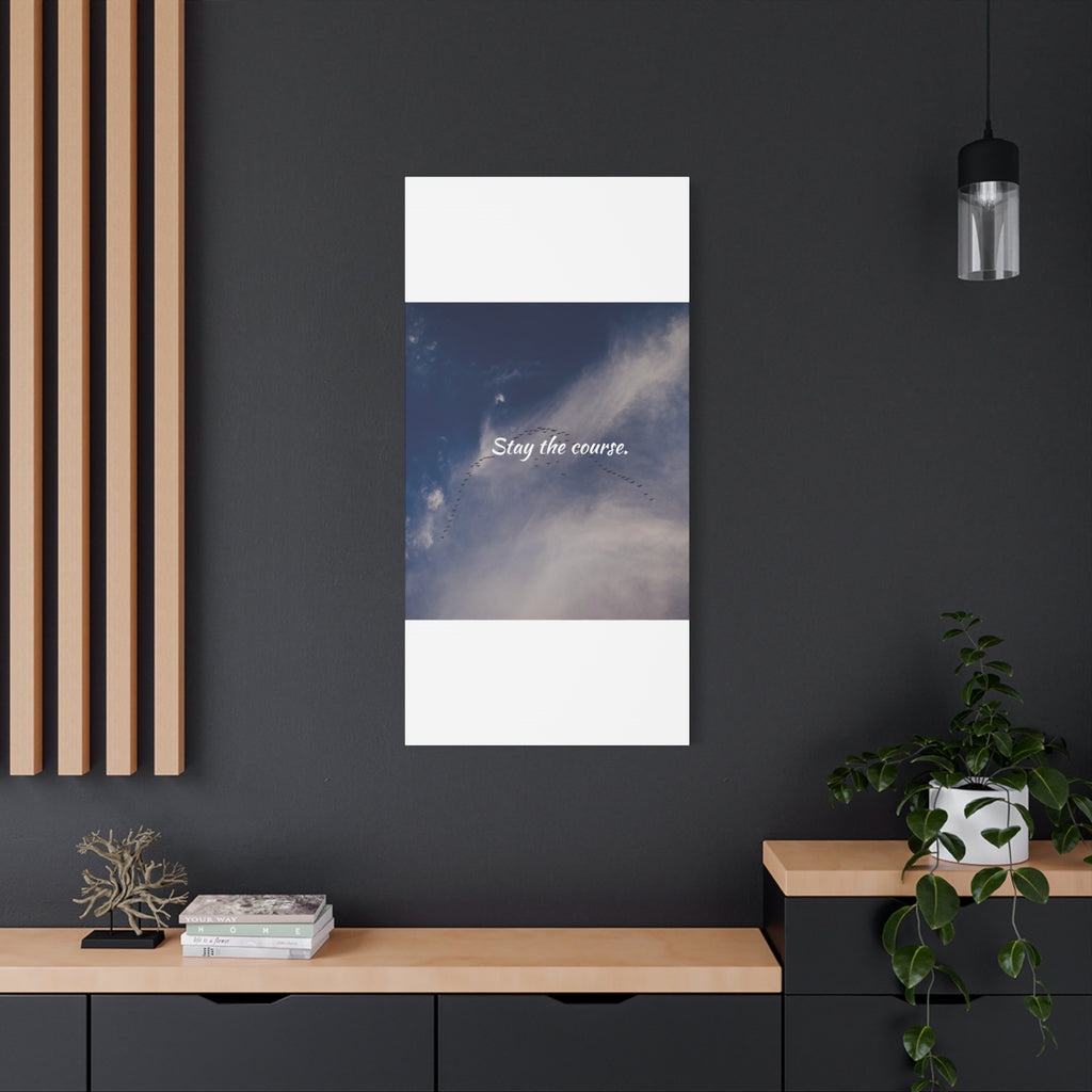 Poster with a motivational quote on a dark wall in a modern interior setting.