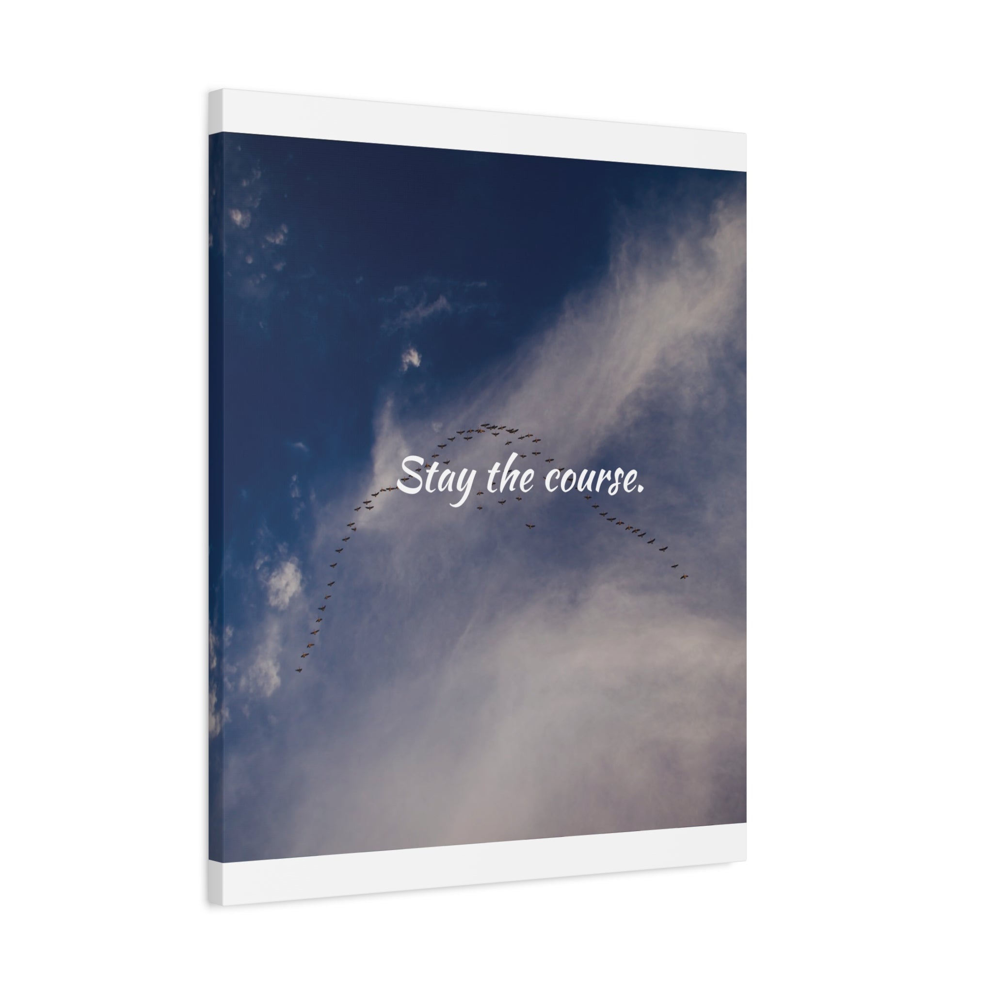 Notebook with a design of birds in formation against a blue sky with the text 'Stay the course.'
