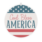 Round sign with 'God Bless America' text and American flag design on a white background