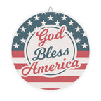 Decorative sign with American flag design and 'God Bless America' text on a white background