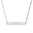 Silver necklace with 'Aquarius Rising' pendant on a white background