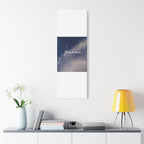 Poster with text on a wall above a shelf with decor items