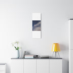 Modern interior with a yellow lamp, white vase with flowers, and framed picture on a white wall.