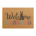 Doormat with 'Welcome' text and rabbit silhouette on a white background