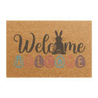 Doormat with 'Welcome' text and rabbit silhouette on a white background