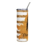Tumbler with gold and white design and straw on a white background