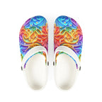 Colorful patterned sandals with white soles on a white background