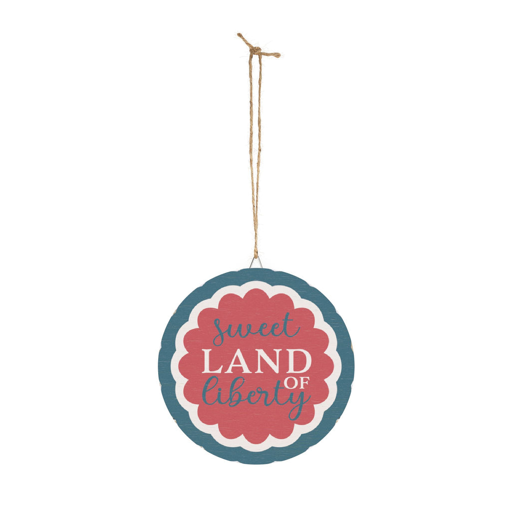 Decorative sign with 'sweet land of liberty' text on a white background