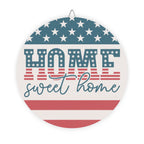 Decorative plate with American flag design and 'Home sweet home' text on a white background