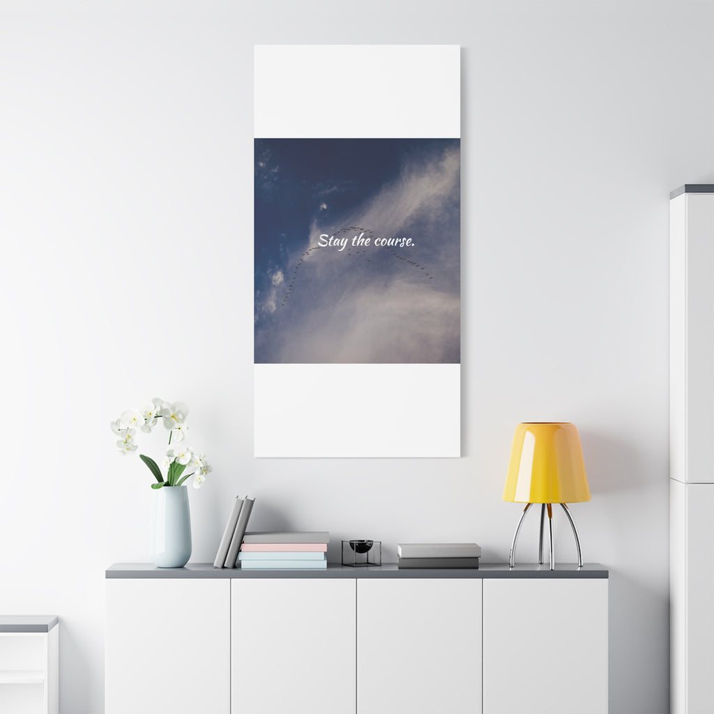 Modern interior with a motivational poster on a white wall, yellow lamp, and decorative items.