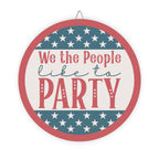 Decorative sign with 'We the People like to PARTY' text and American flag design.