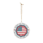 Decorative hanging sign with American flag design and text on a white background
