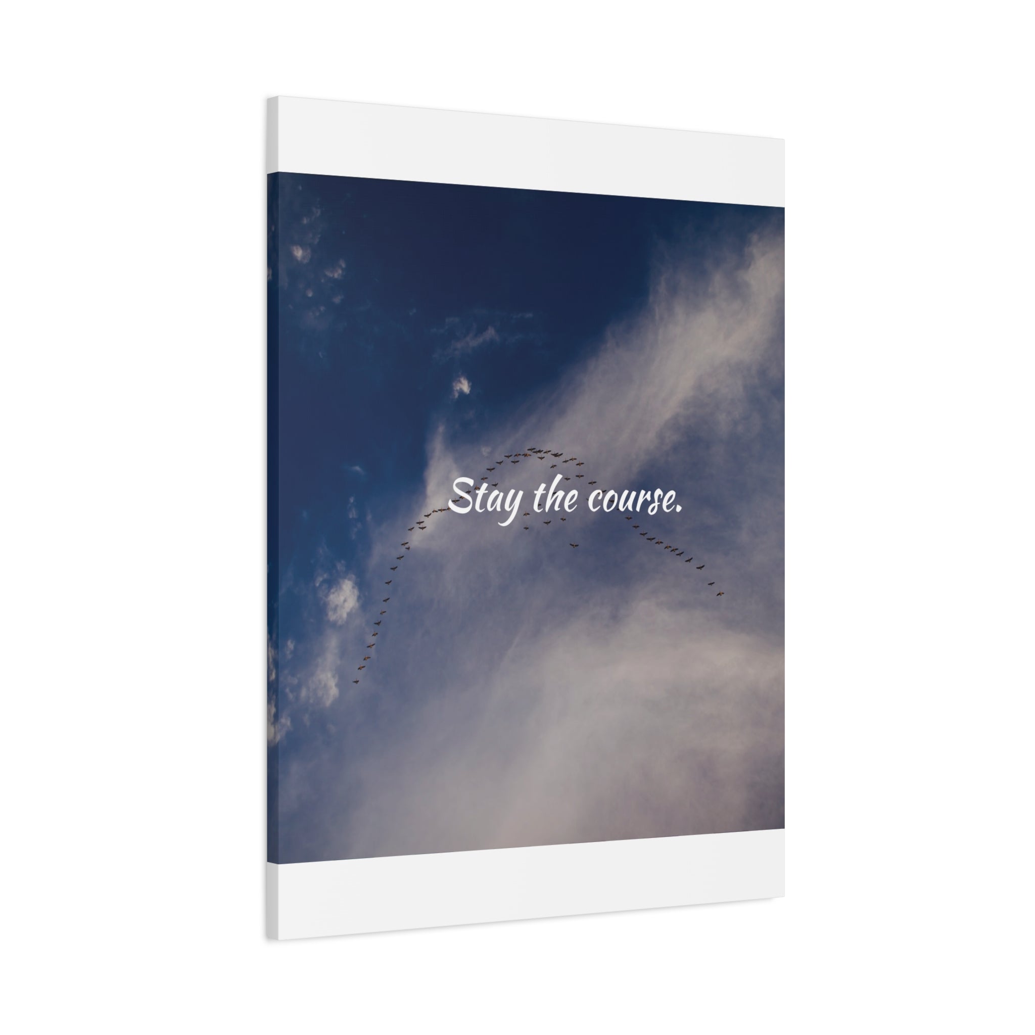 Notebook with a blue sky and cloud cover design on the cover, featuring the text 'Stay the course.'