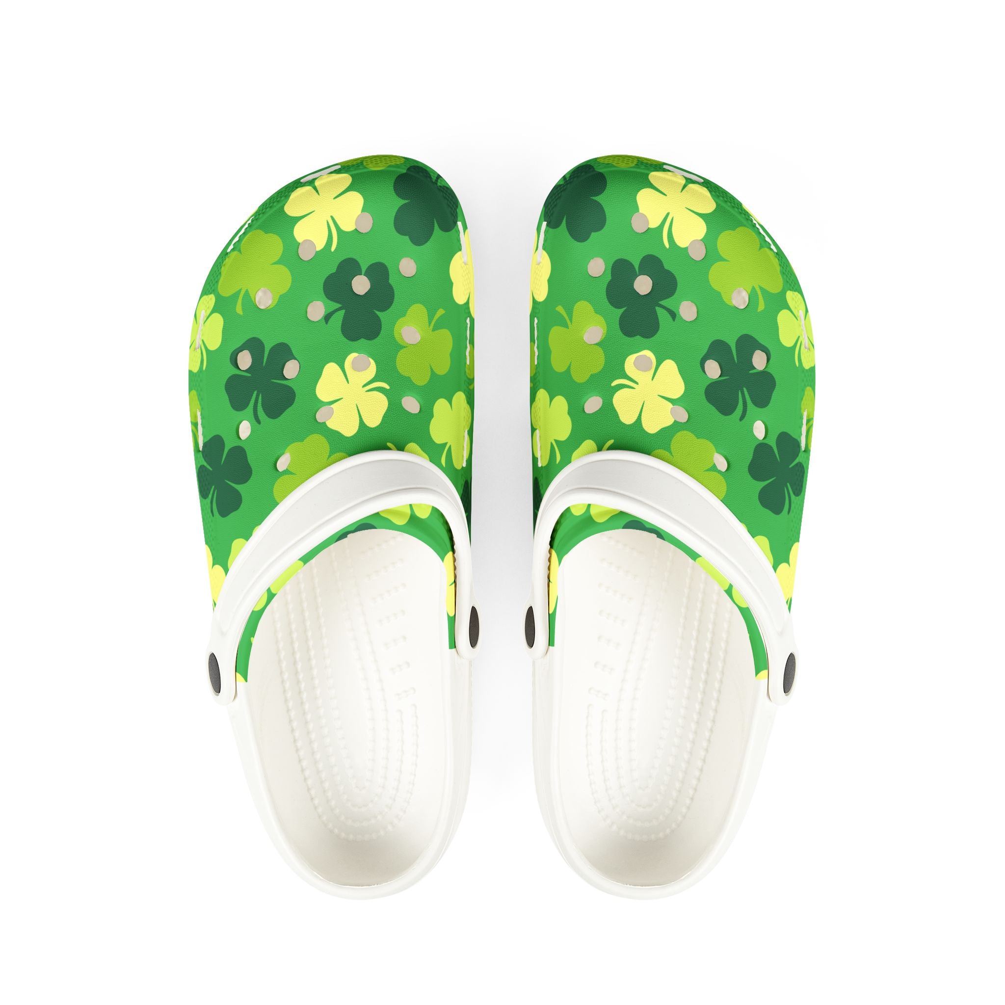 Green floral-patterned clogs with white soles on a white background