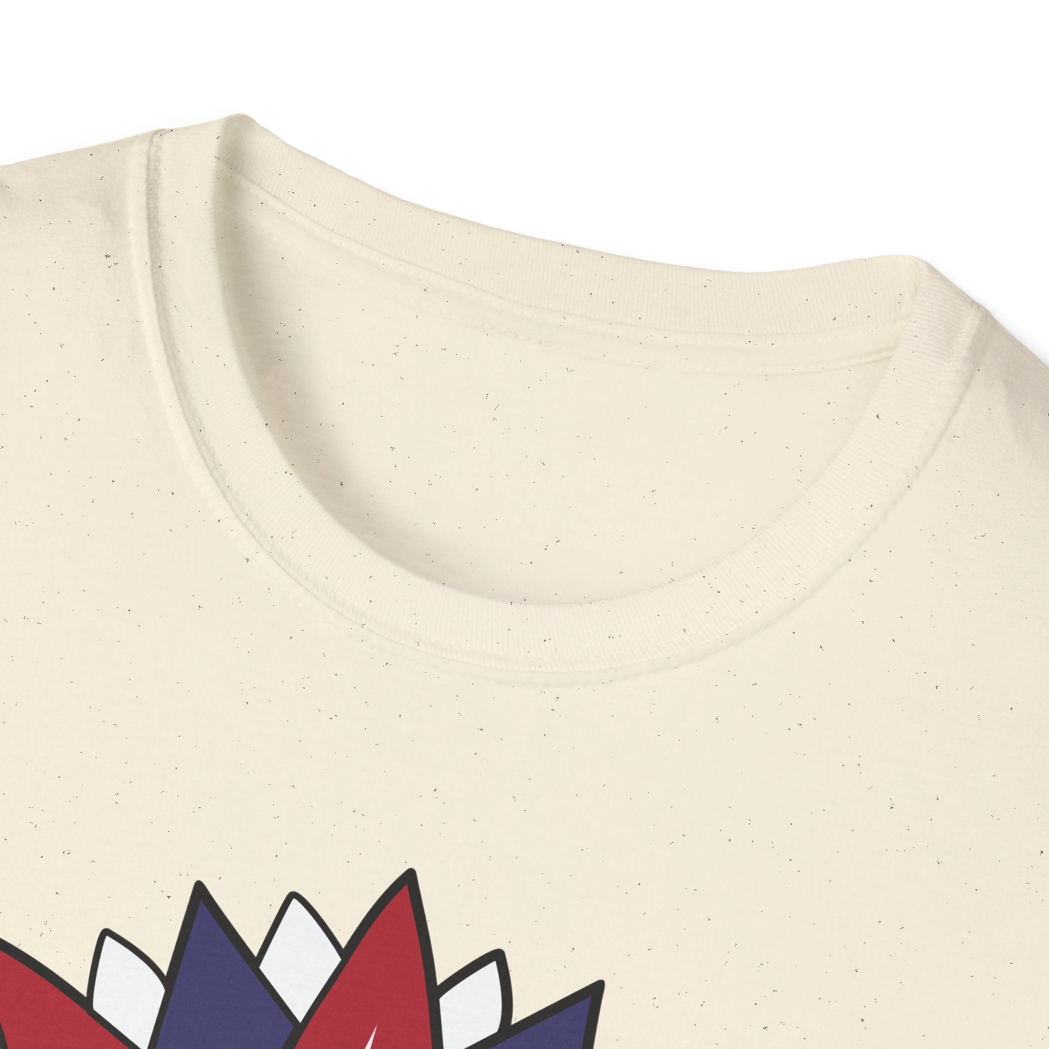 Close-up of a beige t-shirt with colorful geometric designs on a white background