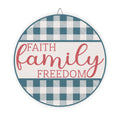 Round sign with 'Faith Family Freedom' text on a blue and white checkered background