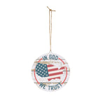 Round wooden sign with American flag and 'In God We Trust' text on a white background