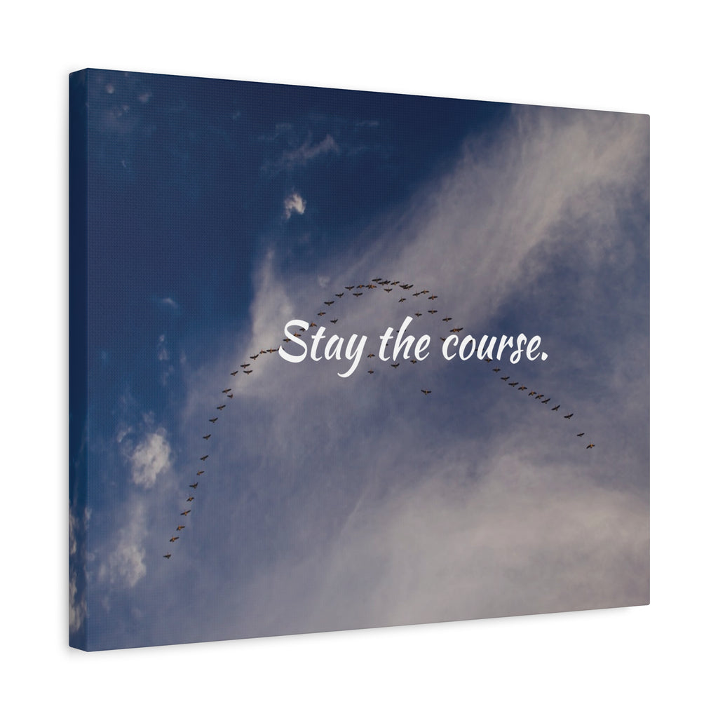 Canvas print with birds flying in a 'V' formation against a blue sky with clouds, featuring the text 'Stay the course.'