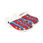 Pair of white clogs with red, white, and blue pattern on a white background
