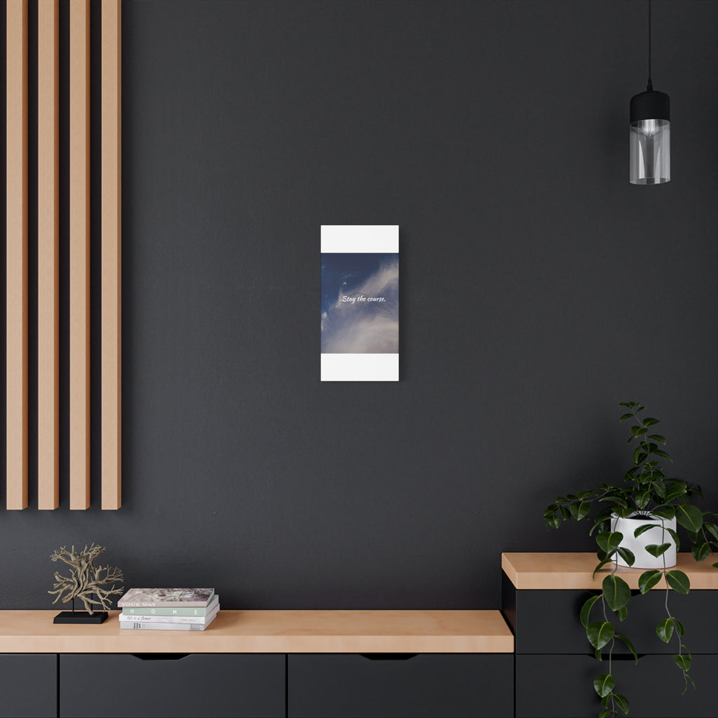Modern interior with a dark wall, wooden shelf, and plant, featuring a vertical rectangular painting.