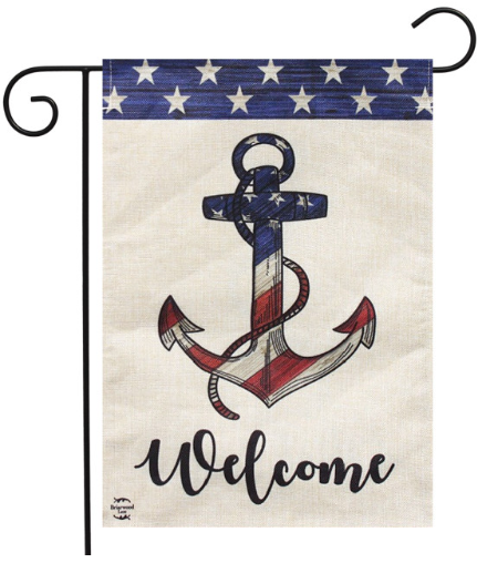 Decorative flag with a patriotic anchor and 'Welcome' text on a wooden background.