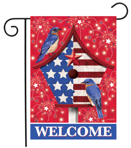 Decorative garden flag with patriotic design featuring birds and 'WELCOME' text on a red background.