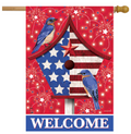 Decorative flag with a birdhouse design featuring American flags, bluebirds, and fireworks on a red background.