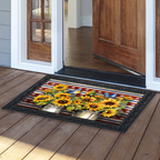 Decorative doormat with sunflower design on a wooden floor outside a house.