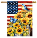 Decorative flag with American flag design, sunflowers, and blue birds and butterflies.