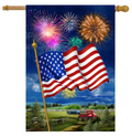 American flag with fireworks and a rural scene on a flag