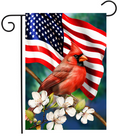 Flag with American flag, cardinal bird, and white flowers on a green background