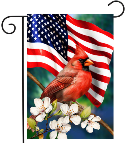 Flag with American flag, cardinal bird, and white flowers on a green background