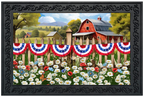 Framed artwork of a rural scene with a red barn, picket fence, and colorful flowers.