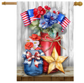 Decorative flag with red, white, and blue flowers, jars, and a star on a wooden surface.