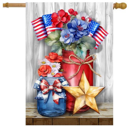 Decorative flag with red, white, and blue flowers, jars, and a star on a wooden surface.
