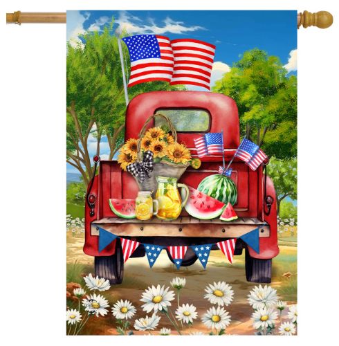 Decorative flag with a red truck, American flags, and summer items against a scenic background.