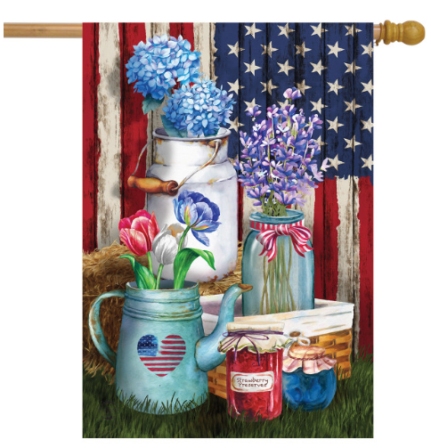 Decorative flag with floral arrangements and a heart-shaped jar against an American flag background