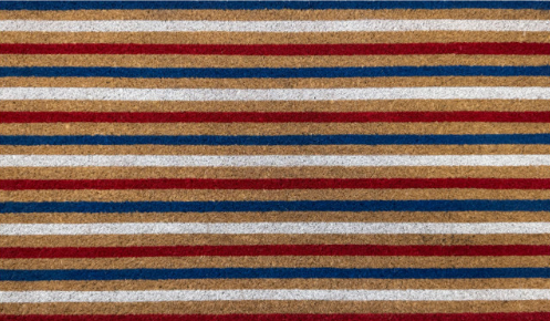 Striped rug with red, blue, and beige horizontal stripes
