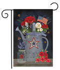 Decorative garden flag with a star-patterned watering can, flowers, and an American flag on a dark background.