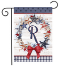 Decorative garden flag with stars, a bow, and the letter 'R' on a wooden background.