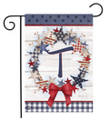 Decorative garden flag with stars, a bow, and plaid patterns on a white background.