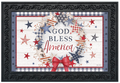 Decorative mat with 'God Bless America' text and patriotic design, framed in black.