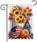 Decorative flag with American flags, sunflowers, pumpkins, and a birdhouse on a wooden background.