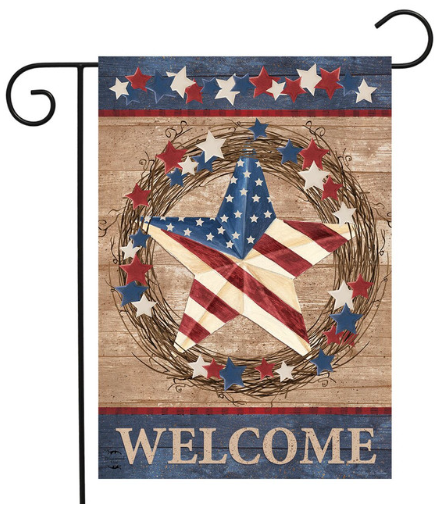 Decorative flag with American flag, stars, and 'Welcome' text on a wooden background.