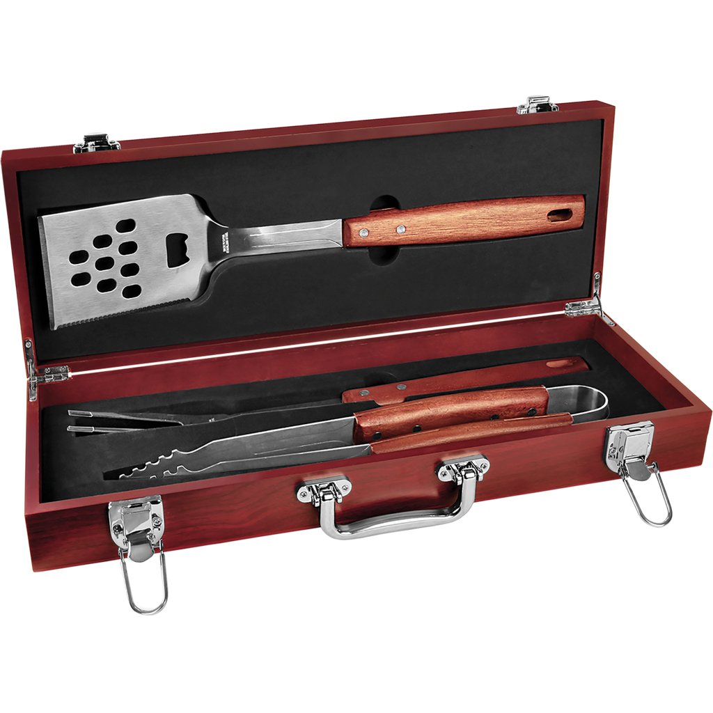 Barbecue tool set with wooden handles in a red case on a white background