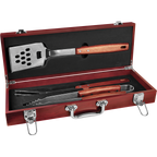 Barbecue tool set with wooden handles in a red case on a white background
